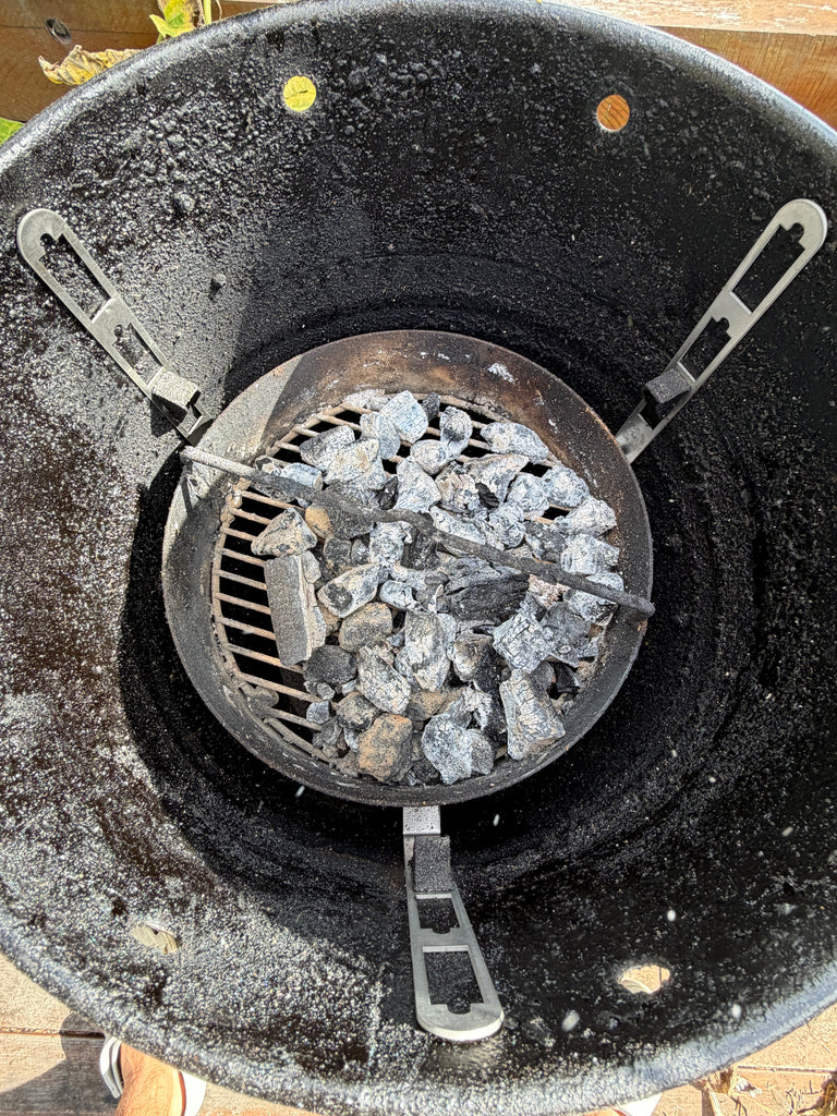 BBQ BOI Pit Barrel Grate Mates installed inside a Pit Barrel Cooker above the charcoal basket for adjustable cooking grate support