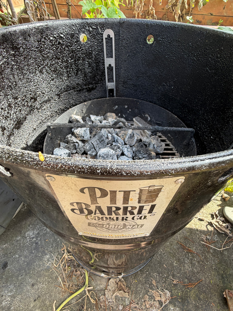 BBQ BOI Pit Barrel Grate Mates installed inside a Pit Barrel Cooker for adjustable cooking grate support above the charcoal basket