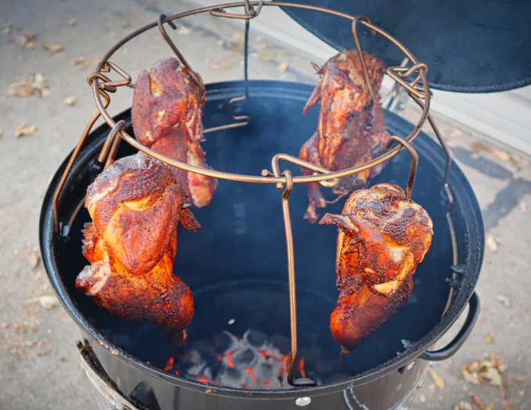 Pit Barrel Weber Smokey Mountain 18" Hanging System with whole chickens suspended for vertical smoking over charcoal